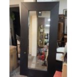 A LARGE MODERN FRAMED MIRROR 190 X 94 CM