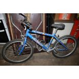 A BLUE RALEIGH BICYCLE