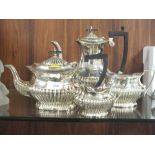 A SILVER PLATED FOUR PIECE TEA SERVICE