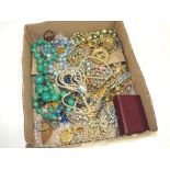 A BOX OF COSTUME JEWELLERY