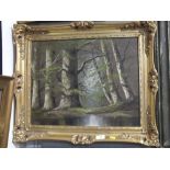 A GILT FRAMED OIL ON CANVAS DEPICTING A WOODLAND RIVER SCENE