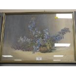 A FRAMED AND GLAZED WATERCOLOUR BY A J MANNINGHAM-BUTLER DEPICTING A STILL LIFE STUDY OF FLOWERS