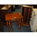 A YEW WOOD NEST OF TABLES & A CD RACK (2)