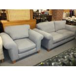 A MODERN GREY SOFA AND MATCHING ARMCHAIR (2)