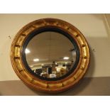 AN ANTIQUE REGENCY CONVEX CIRCULAR GILT WALL MIRROR DIAMETER 58 CM