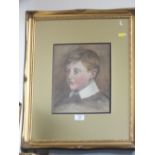 A FRAMED AND GLAZED 19TH CENTURY WATERCOLOUR PORTRAIT OF A YOUNG BOY