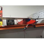 A REMOTE CONTROLLED AIRPLANE WITH FUTABA CONTROLLER