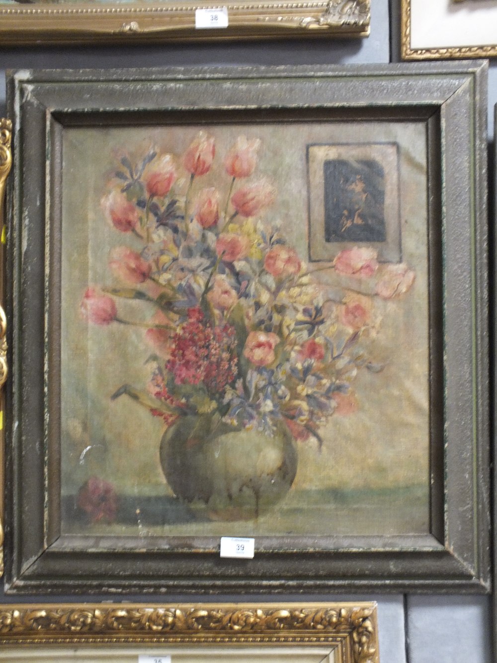 A FRAMED ANTIQUE OIL ON CANVAS STILL LIFE STUDY OF FLOWERS IN A VASE