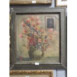 A FRAMED ANTIQUE OIL ON CANVAS STILL LIFE STUDY OF FLOWERS IN A VASE