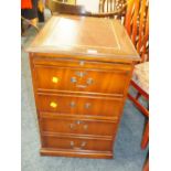 A REPRODUCTION MAHOGANY FILING CABINET WITH LEATHER TOP