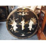 A CIRCULAR ORIENTAL PAINTED FIGURATIVE WALL HANGING