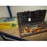 A CASED SOCKET SET PLUS A BOXED SANDER AND A WORK BENCH