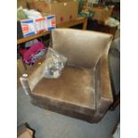 A MODERN UPHOLSTERED ARMCHAIR NOTE - LOOSE LEG