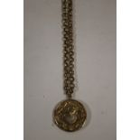 A 9CT GOLD LOCKET ON 9CT GOLD CHAIN A/F