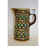 AN ANTIQUE WEDGWOOD MAJOLICA JUG A/F EMBELLISHED WITH THE MOTTO WHAT THO MY CATES BE POOR TAKE