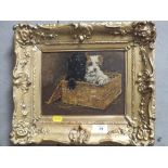 A GILT FRAMED OIL PAINTING DEPICTING PUPPIES IN A BASKET