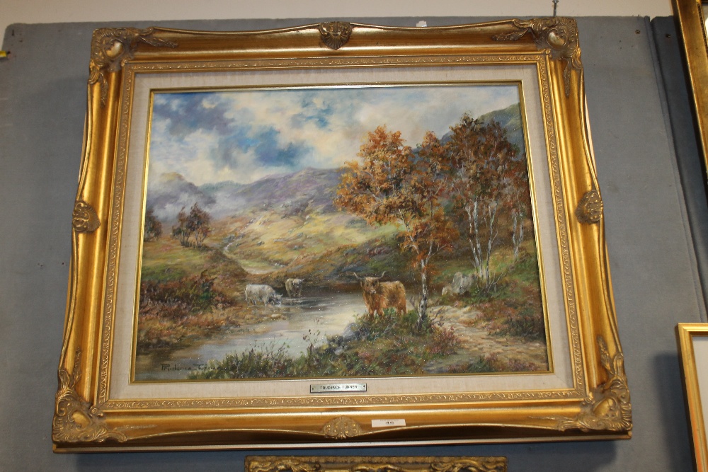 A GILT FRAMED OIL PAINTING OF HIGHLAND CATTLE IN A STREAM SIGNED PRUDENCE TURNER