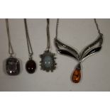 FOUR SILVER NECKLACES