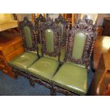 A SET OF SIX CARVED OAK ANTIQUE JACOBEAN STYLE DINING CHAIRS