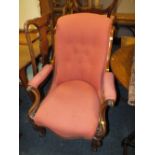 A VICTORIAN MAHOGANY FRAMED UPHOLSTERED OPEN ARMCHAIR