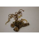 A BAG OF YELLOW METAL JEWELLERY ETC.