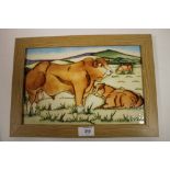 A MOORCROFT WALL PLAQUE FEATURING LIMOUSIN CATTLE