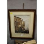 A FRAMED AND GLAZED WATERCOLOUR OF A VENETIAN SCENE