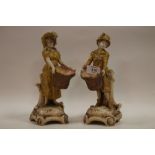 A PAIR W & R AUSTRIAN SPILL VASE CERAMIC FIGURES OF A GIRL AND BOY CARRYING BASKETS A/F