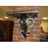 AN EDWARDIAN LARGE EBONISED AND GILT WALL BRACKET W-42 CM