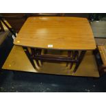 A RETRO 'SCHREIBER' NEST OF TABLES AND A 'VANSON' COFFEE TABLE (2)