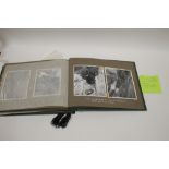 A VINTAGE PHOTOGRAPH ALBUM CONTAINING IMAGES OF HIROSHIMA JAPAN ETC