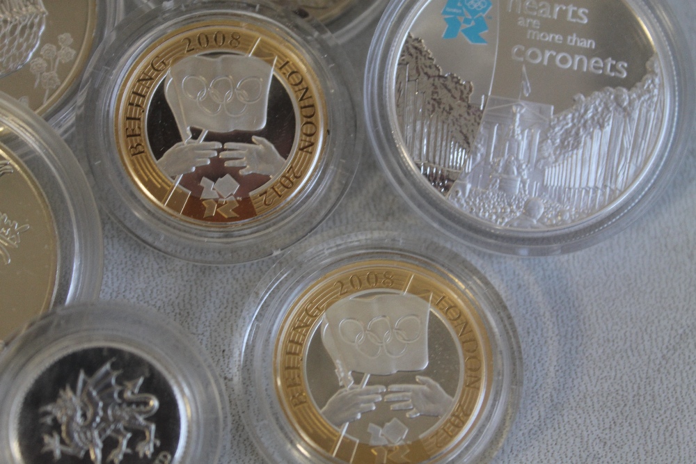 A QUANTITY OF SILVER PROOF COINS IN CAPSULES , to include £1 , £2, and £5 coins etc. - Image 3 of 3