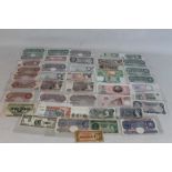 A COLLECTION OF BRITISH AND WORLD BANK NOTES, comprising Bank of England issues to include £10, a G