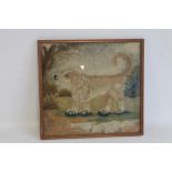 A 19TH CENTURY WOOL WORK PICTURE DEPICTING A DOG, 37 cm x 34.5 cm including frame