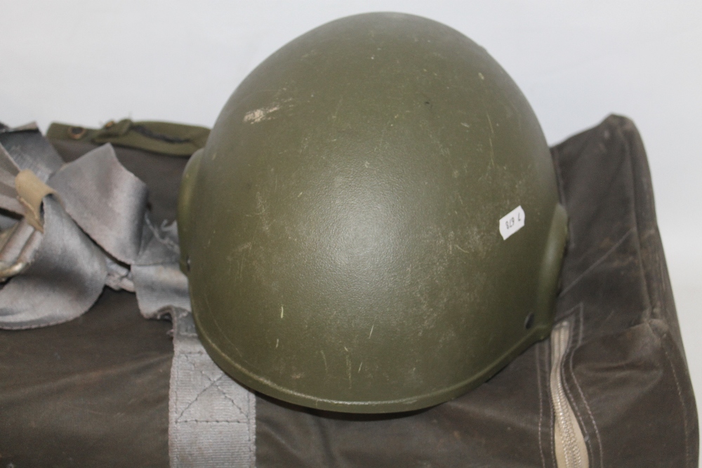 THREE BRITISH ARMY KEVLAR COMBAT HELMETS, two with fabric camouflage covers, together with a G-Q Pa - Image 4 of 4