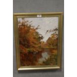 A FRAMED OIL ON CANVAS OF AN AUTUMNAL SCENE SIGN A SUTTON