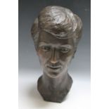 A BRONZE BUST DEPICTING A FEMALE, signed but indistinct, H 37.5 cm