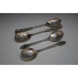 TWO PAIRS OF HALLMARKED SILVER ORNATE SPOONS CONSISTING OF A PAIR OF PIERCED EXAMPLES - SHEFFIELD