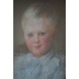 A LATE 19TH / EARLY 20TH CENTURY OVAL PORTRAIT STUDY OF A YOUNG CHILD, unsigned, pastel on paper,