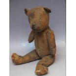 A VINTAGE PLAY WORN TEDDY BEAR FOR RESTORATION, straw filled body, H 38 cm A/F