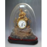 A 19TH CENTURY GILT METAL CONTINENTAL MANTEL CLOCK UNDER A GLASS DOME, with figurative surmount, H