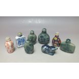 A COLLECTION OF ORIENTAL CERAMIC SNUFF BOTTLES, to include an unusual animal shaped example, all but