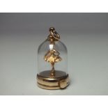 AN UNUSUAL 9CT GOLD DANCING BALLERINA WIND UP MOVING PENDANT / CHARM WITH DOME, attached