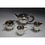 A HALLMARKED SILVER THREE PIECE TEA SET BY FATTORINI & SONS LTD - SHEFFIELD 1939/1940, together with