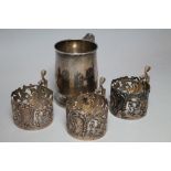 A HALLMARKED CHESTER SILVER CHRISTENING CUP, together with three William Comyns coffee can holders(