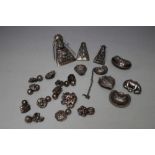 A SELECTION OF WHITE METAL ORIENTAL TYPE ROBE ADORNMENTS ETC, together with studs and bells in the