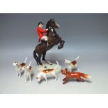 A BESWICK HUNTSMAN ON REARING HORSE, second version, model No. 868, H 23 cm, S/D, together with four