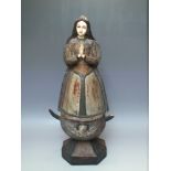 ANTIQUE PAINTED WOODEN FIGURE OF A FEMALE PRAYING, with glass eyes and carved bone face and hands on