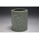 A CHINESE TYPE CELADON BRUSH POT, featuring Dragons spitting water, H 12.25 cm 16 cm