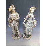 A PAIR OF LARGE CONTINENTAL PORCELAIN FIGURES, both in classical dress, blue crossed marks to